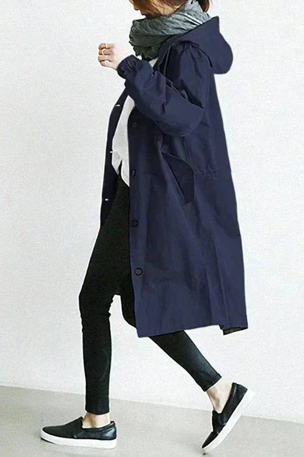 Impermeável feminino com capuz oversize respirável corte urbano