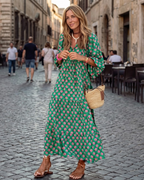 Vestido maxi boho feminino estampado geométrico com decote V e corte fluido