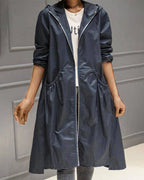Casaco trench coat feminino ajustado com fechos de correr e pregas estruturadas