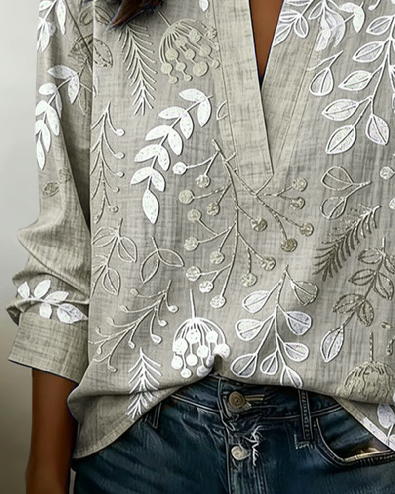 Blusa feminina floral com decote em V, tecido leve e estampa pastel