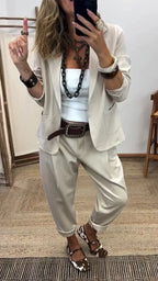 Conjunto feminino de blazer e calça slim, look executivo com botão único e bolsos