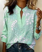 Blusa feminina floral com decote em V, tecido leve e estampa pastel