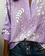 Blusa feminina floral com decote em V, tecido leve e estampa pastel