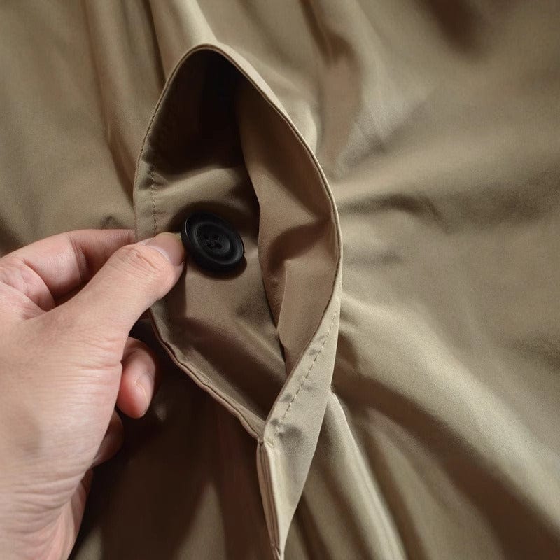 Casaco casual feminino gola alta com botões frontais e bolsos laterais corte reto