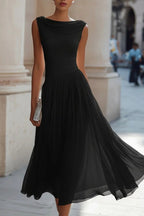 Vestido midi feminino sem mangas linha A com decote cascata e saia plissada