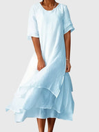 Vestido feminino decote aberto corte fluido elegante