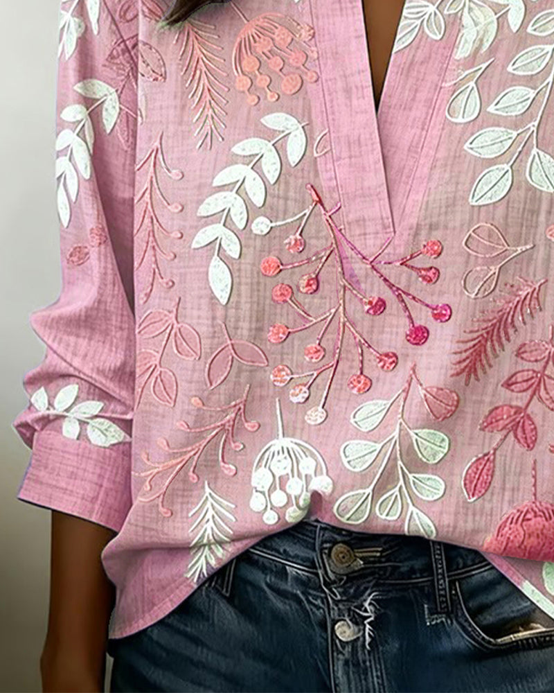 Blusa feminina floral com decote em V, tecido leve e estampa pastel