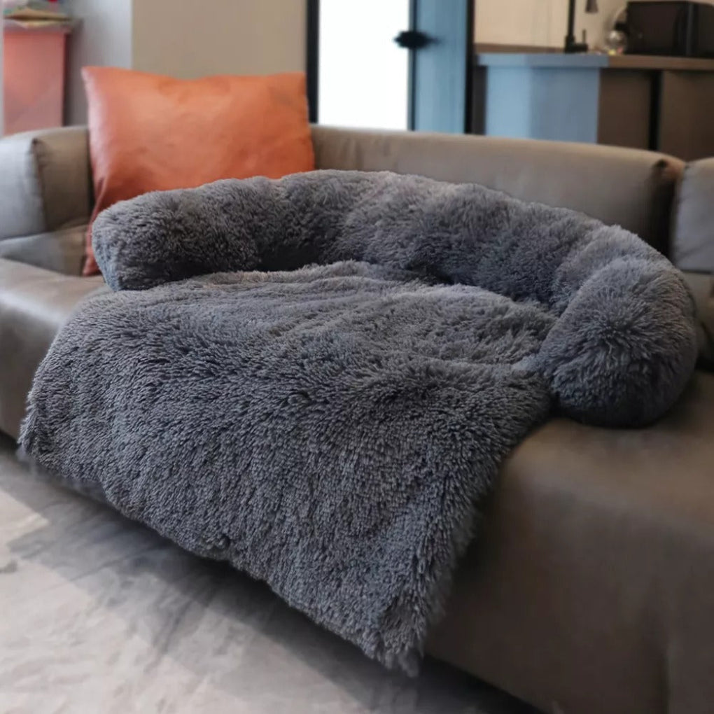 Cama sofá calmante para cães com bordas elevadas e pelo sintético macio
