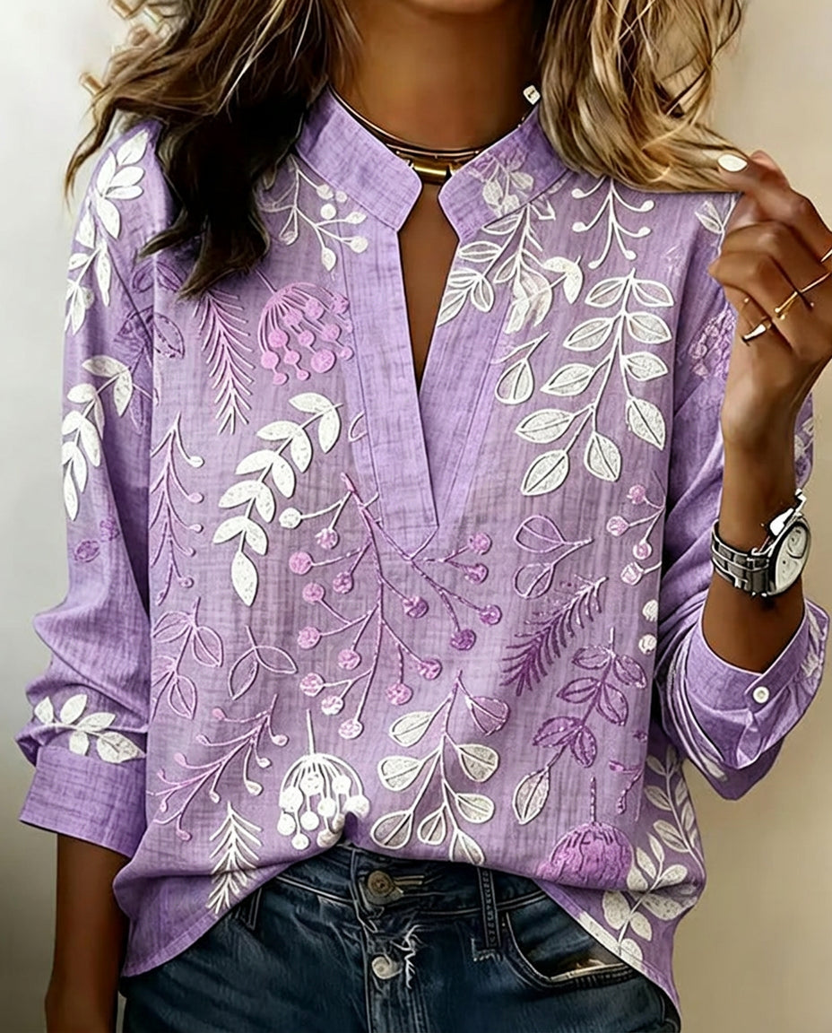 Blusa feminina floral com decote em V, tecido leve e estampa pastel