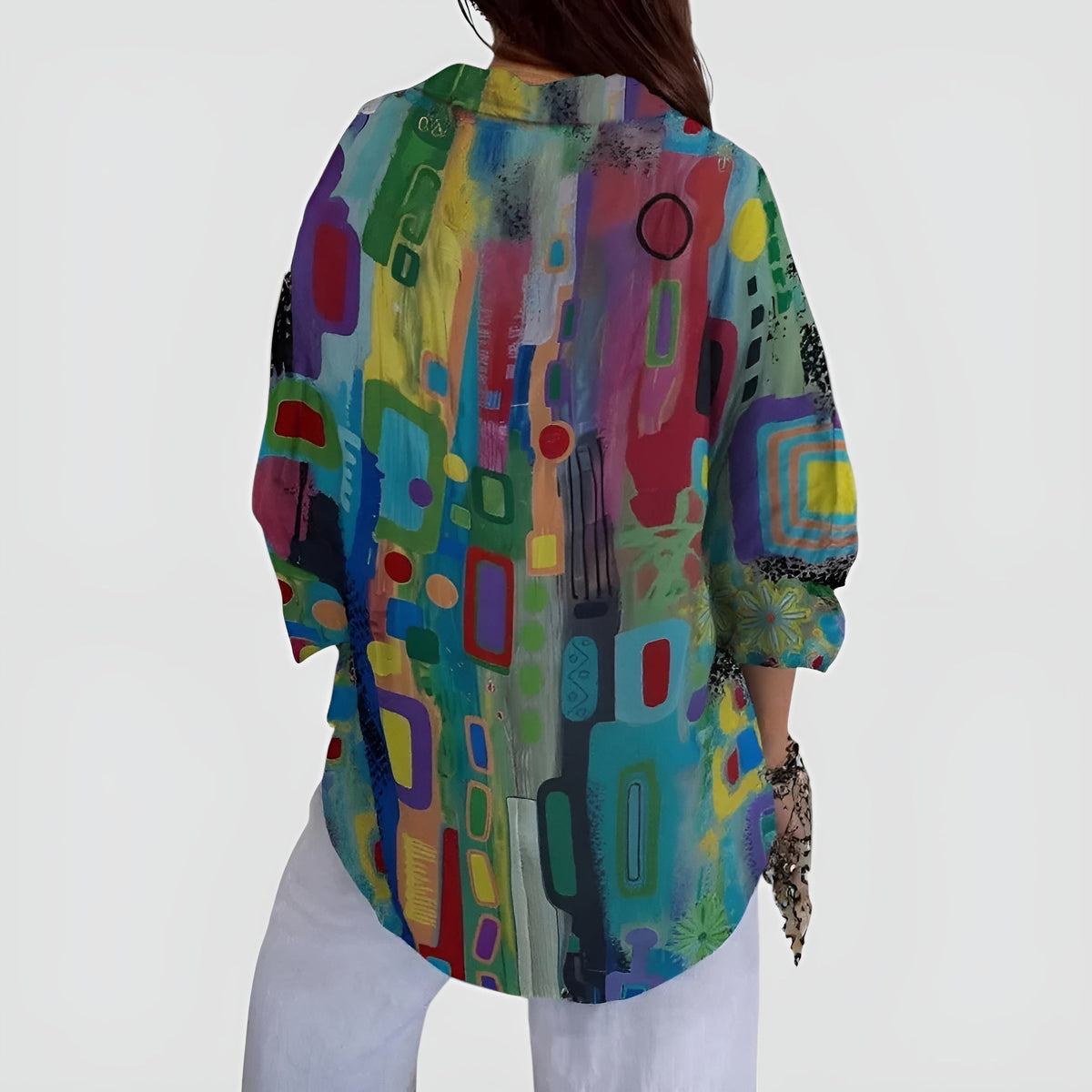 Blusa feminina com padrão geométrico caimento solto tecido leve