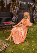 Vestido longo floral feminino com decote em V e silhueta fluida