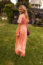 Vestido longo floral feminino com decote em V e silhueta fluida