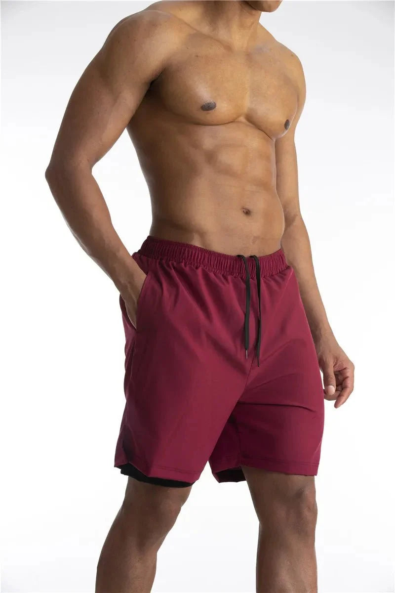 Calções de corrida masculinos com liner integrado e bolso para telemóvel