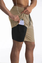 Calções de corrida masculinos com liner integrado e bolso para telemóvel