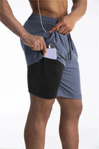 Calções de corrida masculinos com liner integrado e bolso para telemóvel