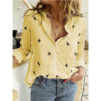 Blusa feminina manga longa casual com botões frontais em versões lisa e estampada