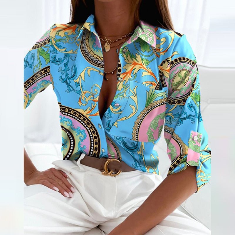 Blusa feminina cetim estampada gola solapa manga longa corte entalhado