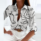 Blusa feminina cetim estampada gola solapa manga longa corte entalhado