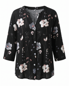 Blusa feminina floral decote V manga três quartos caimento solto