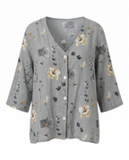 Blusa feminina floral decote V manga três quartos caimento solto